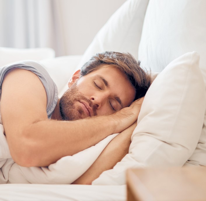 Man sleeping soundly after receiving sleep services such as what is offered at Seaside Dentistry in Mobile AL